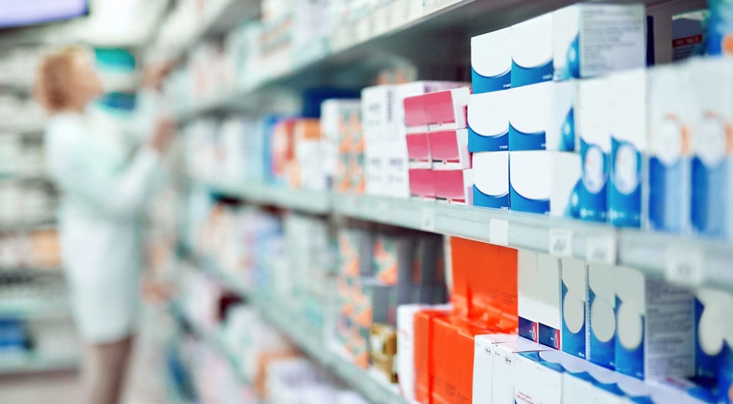 A view of pharmacy shelves displaying an array of medications and health-related items for customer convenience.
